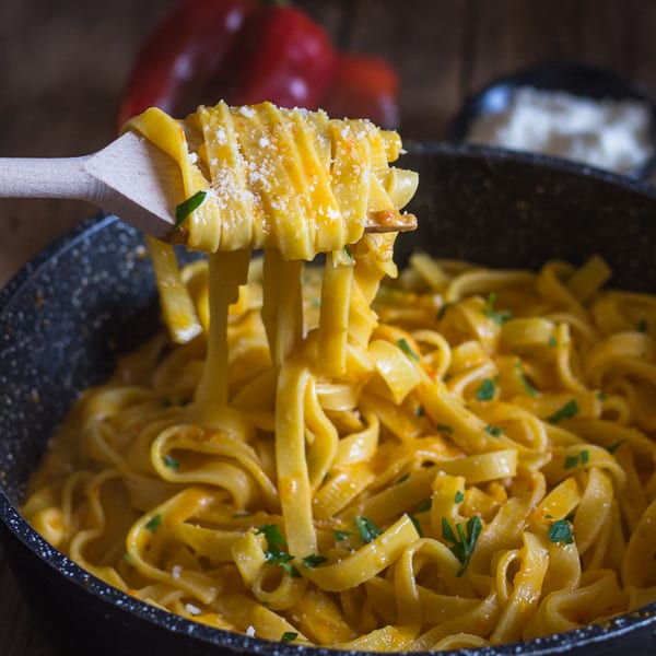 red pepper sauce & fettuccine twirled around a fork