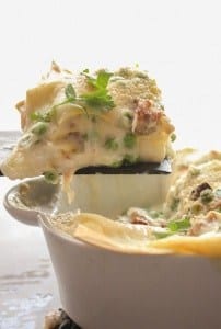 A creamy, delectable Italian Lasagna, layered with sausage, peas, mushrooms and double cheese, perfect, maybe better than the classic.