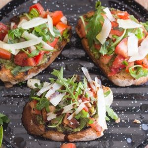 bruschetta with pesto on a black pan grill