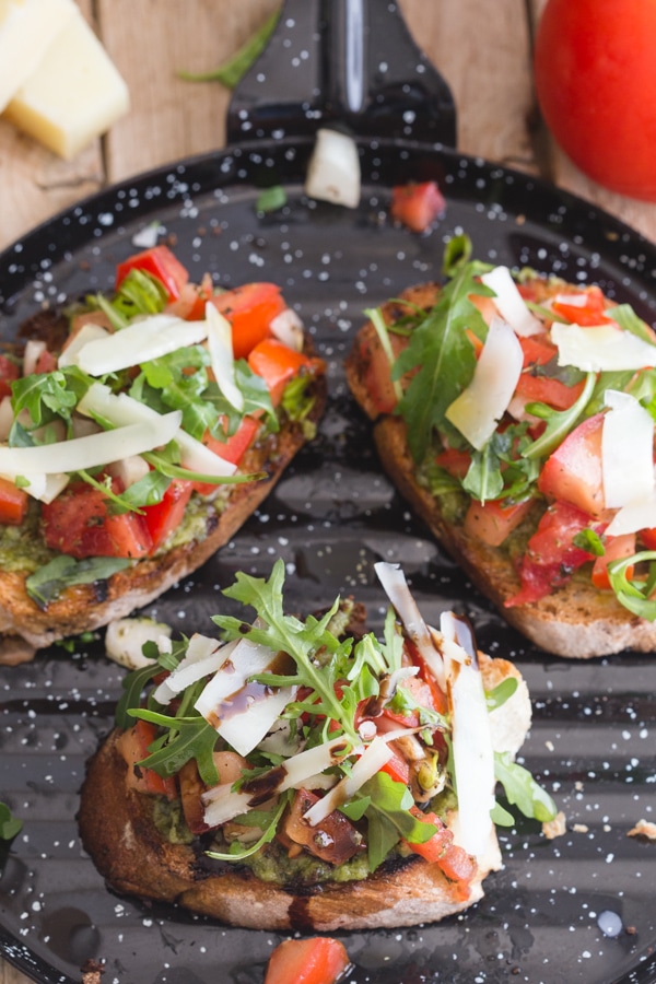 bruschetta with pesto on a black pan grill