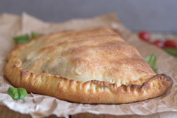 calzone baked on brown paper
