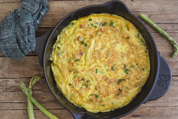 asparagus frittata in a frying pan