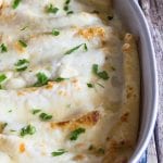 crepe cannelloni white sauce baked in a white pan