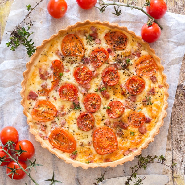 baked tomato savory pie on a board