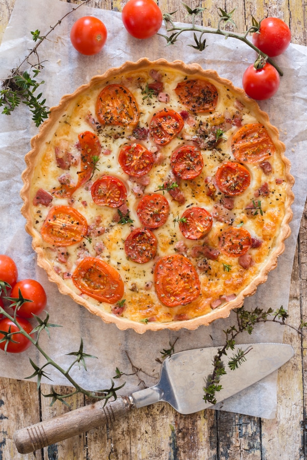 baked tomato savory pie on a board