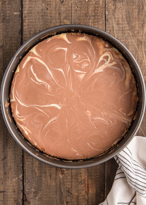 The baked chocolate cheesecake in the pan.