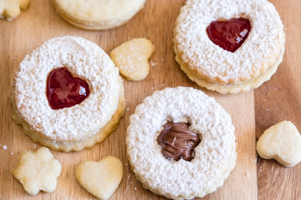 3 sandwich cookies on a board