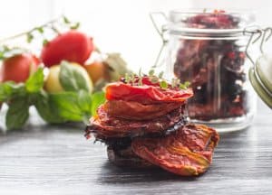 Oven Dried Tomatoes, how to make Homemade Oven Dried Tomatoes delicious and easy, tossed with olive oil and fresh spices. Gluten free.