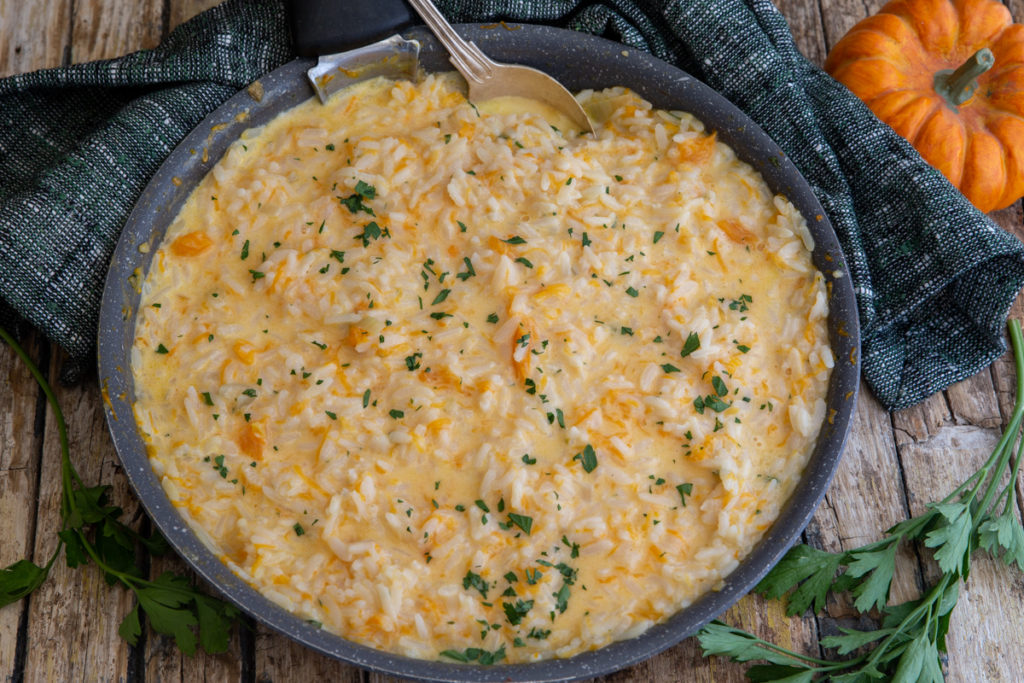 Risotto in a black pan.