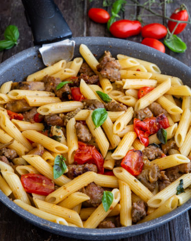 sausage pasta in a black pan