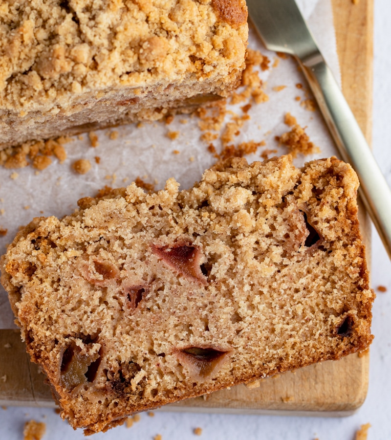 Apple loaf with a slice cut.