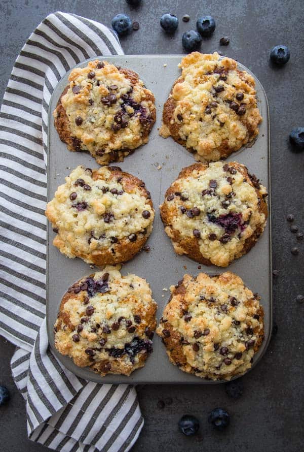 Streusel Topped Blueberry Chocolate Chip Muffins, these fast, easy and delicious muffins are the perfect snack, breakfast treat or dessert.