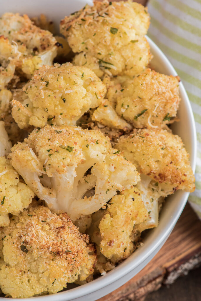 Roasted parmesan in a white bowl.