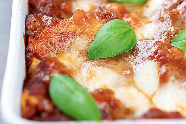 lasagna in a white pan
