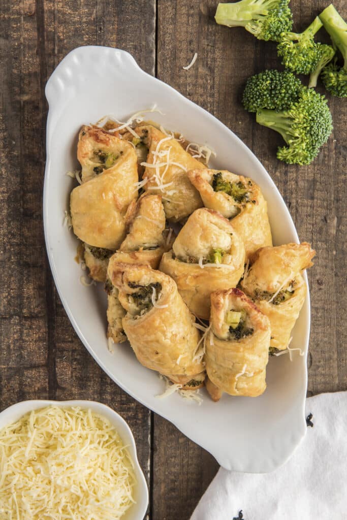 Savory crescents in a white dish.