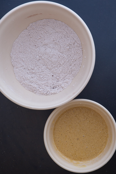 dry ingredients in a white bowl and wet ingredients in a small white bowl.