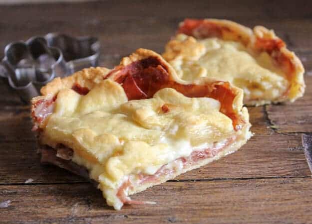 Italian Savory Rustic Pie is a delicious main dish or appetizer. A double creamy filling of prosciutto, Gruyere and a little white sauce.