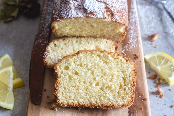 plumcake with 2 slices on a board