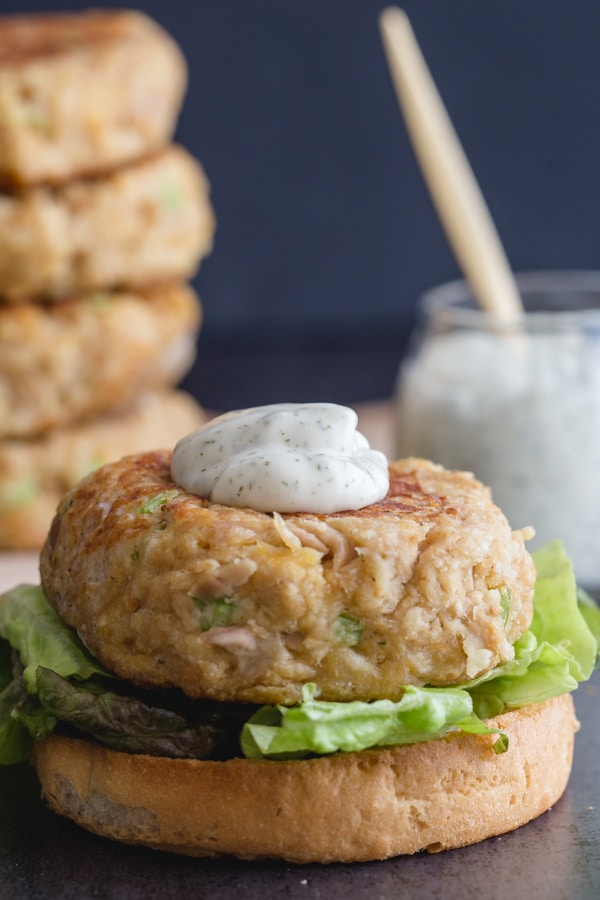 tuna burger with dill sauce on top