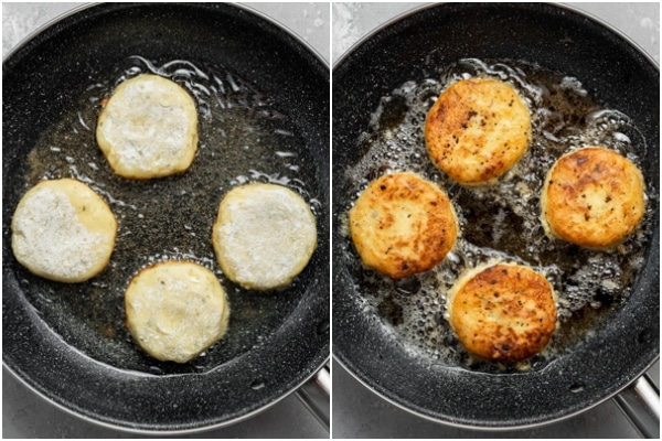 Croquettes cooking in a frying pan.