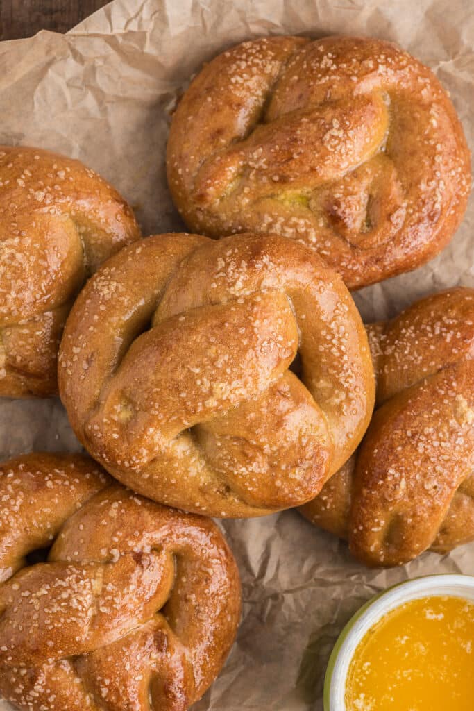 Pretzels on a brown paper bag.