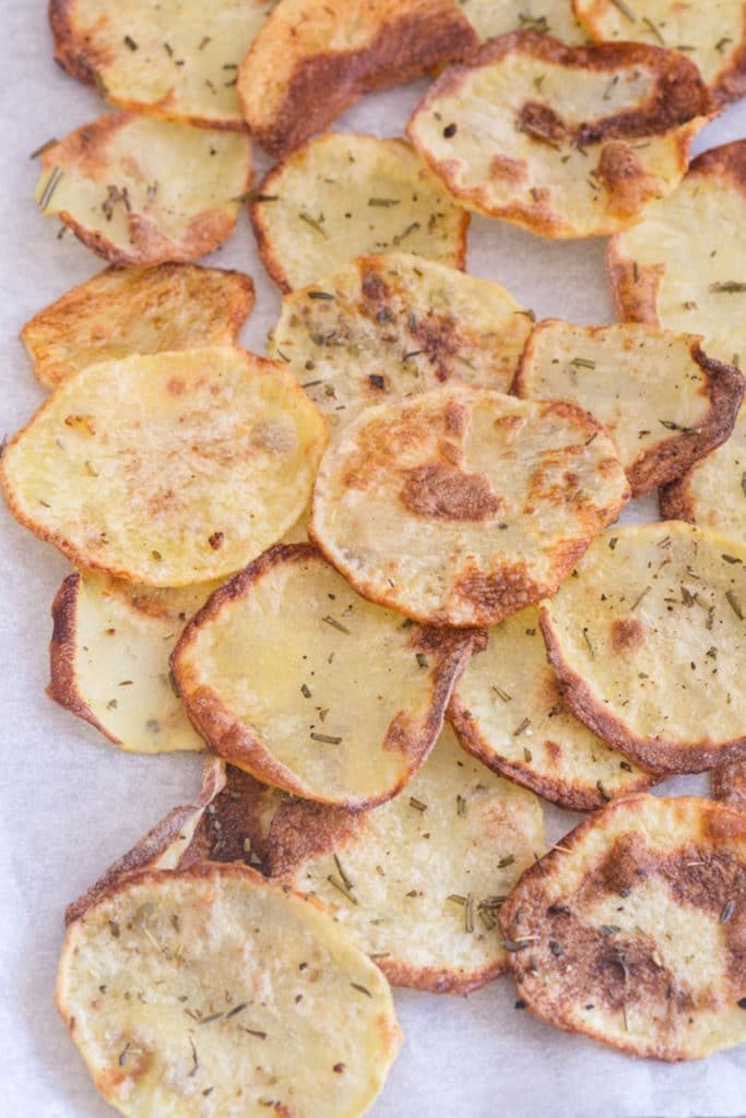 Potato chips on a cookie sheet.