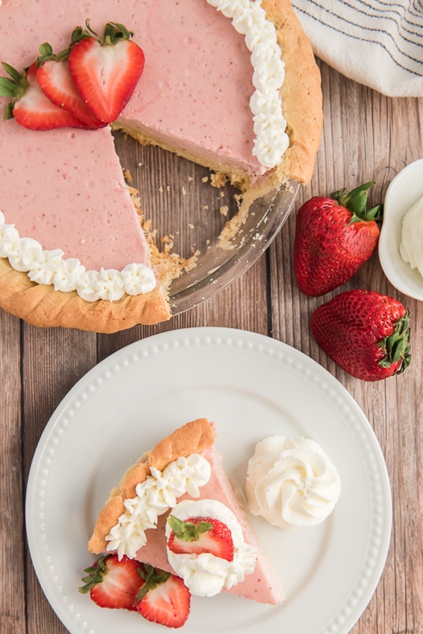 strawberry cheesecake pie on a plate in the pie dish