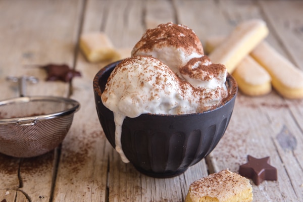 a black bowl with tiramisu ice cream 