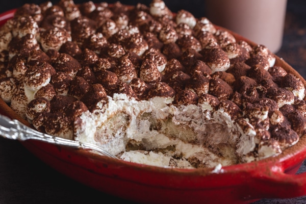 up close easy tiramisu in a red dish