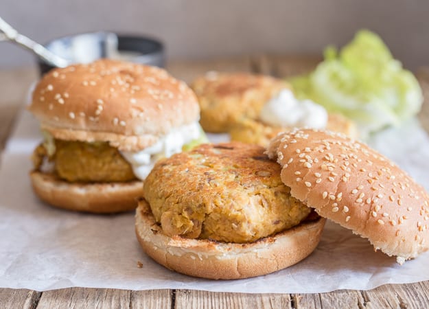 healthy salmon burgers on a white paper