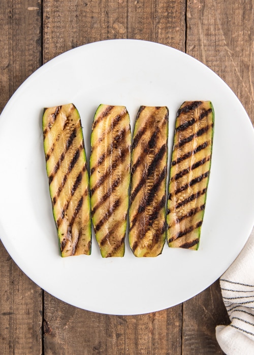 Grilled zucchini on a plate.