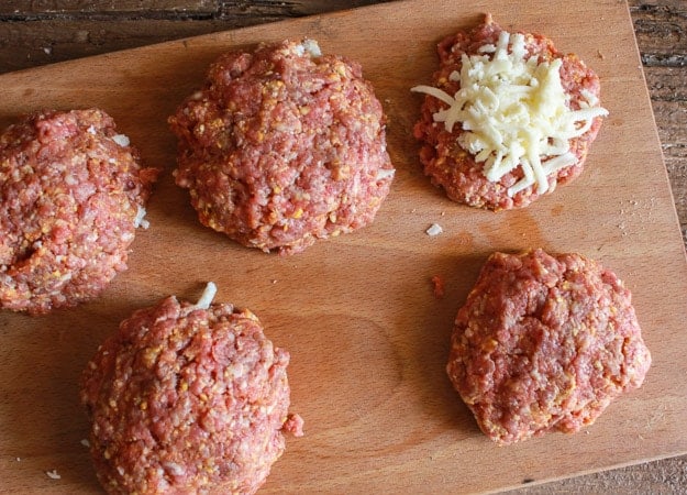 Italian Stuffed Burgers an easy cheese stuffed burger with an Italian flare, grilled or barbecued it is the perfect anytime lunch or dinner dish/anitalianinmykitchen.com