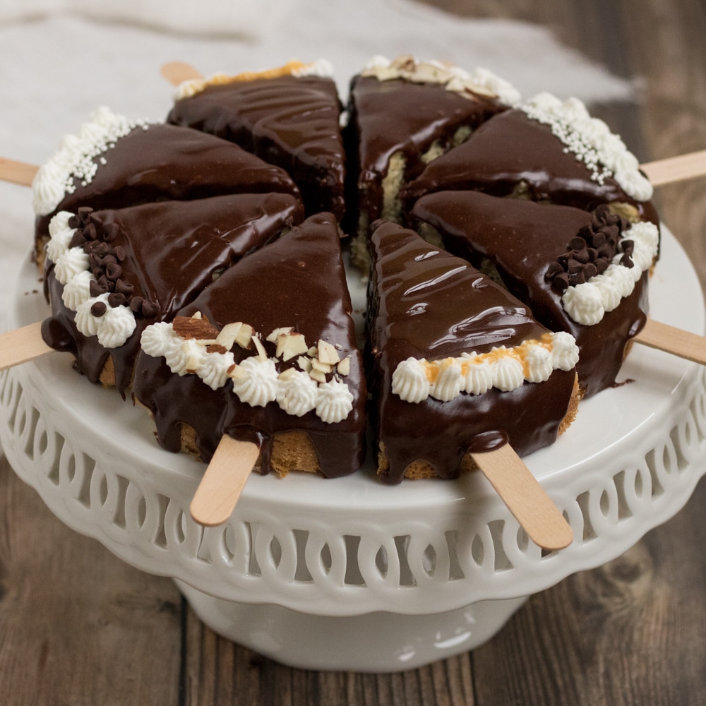White Chocolate Cake Decorated With Popsicle On A Stick Waffle Cone And  Chocolate Balls Kids Birthday Cake Stock Photo - Download Image Now - iStock