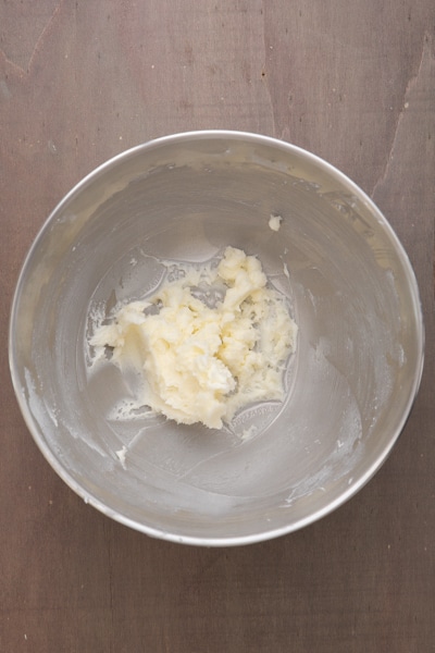 Beating the butter & sugar in a mixing bowl.