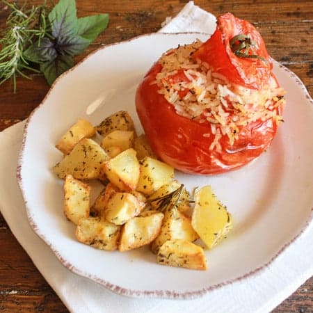 Italian Baked Stuffed Tomatoes with Rice, a healthy vegan/vegetarian dish. The perfect baked dinner recipe, with a delicious rice stuffing.