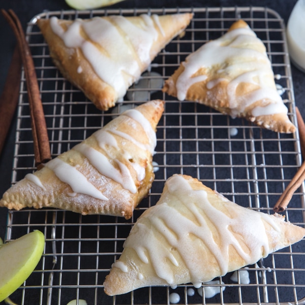 apple turnovers on a wire rack