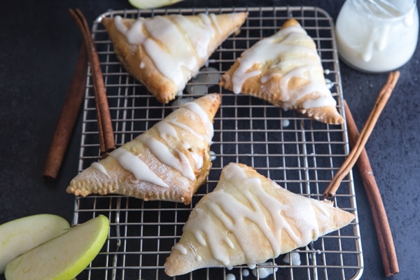 apple turnovers on a wire rack