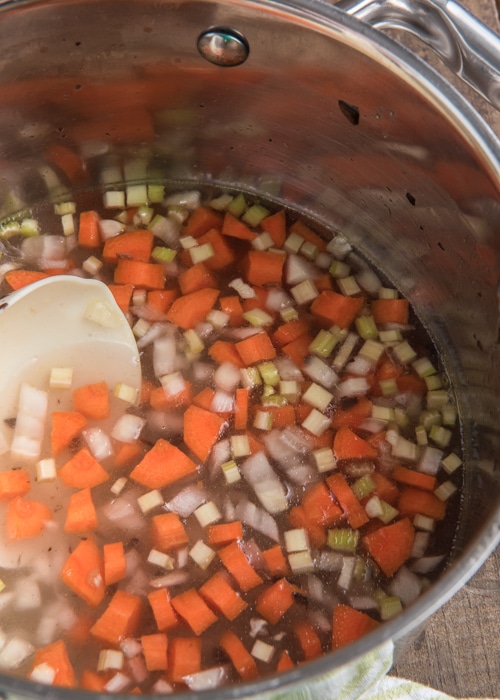 Adding the remaining vegetables and water.