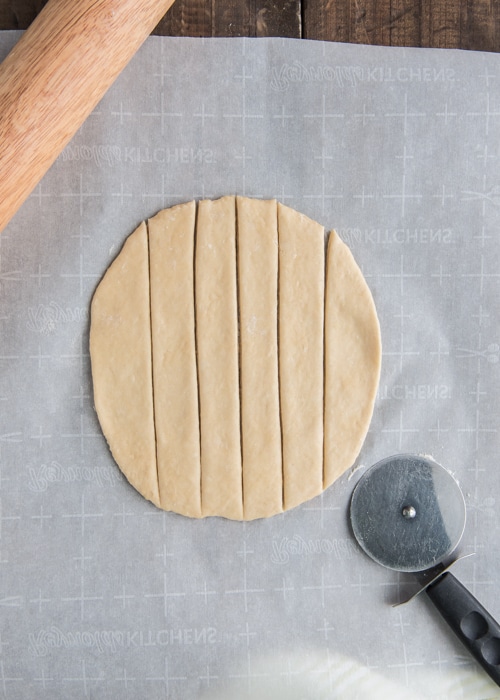 The dough rolled and cut into strips.