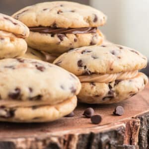 Cookies stacked on a board.