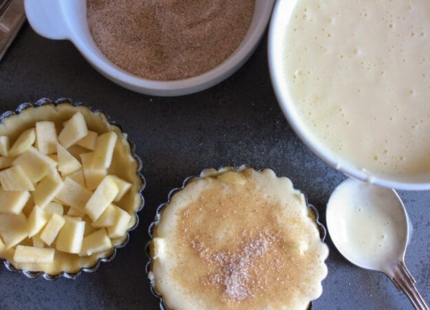 Apple Cinnamon Cheesecake Tarts, an easy delicious Fall Comfort dessert recipe. Drizzle with a little caramel sauce and its perfect. Enjoy