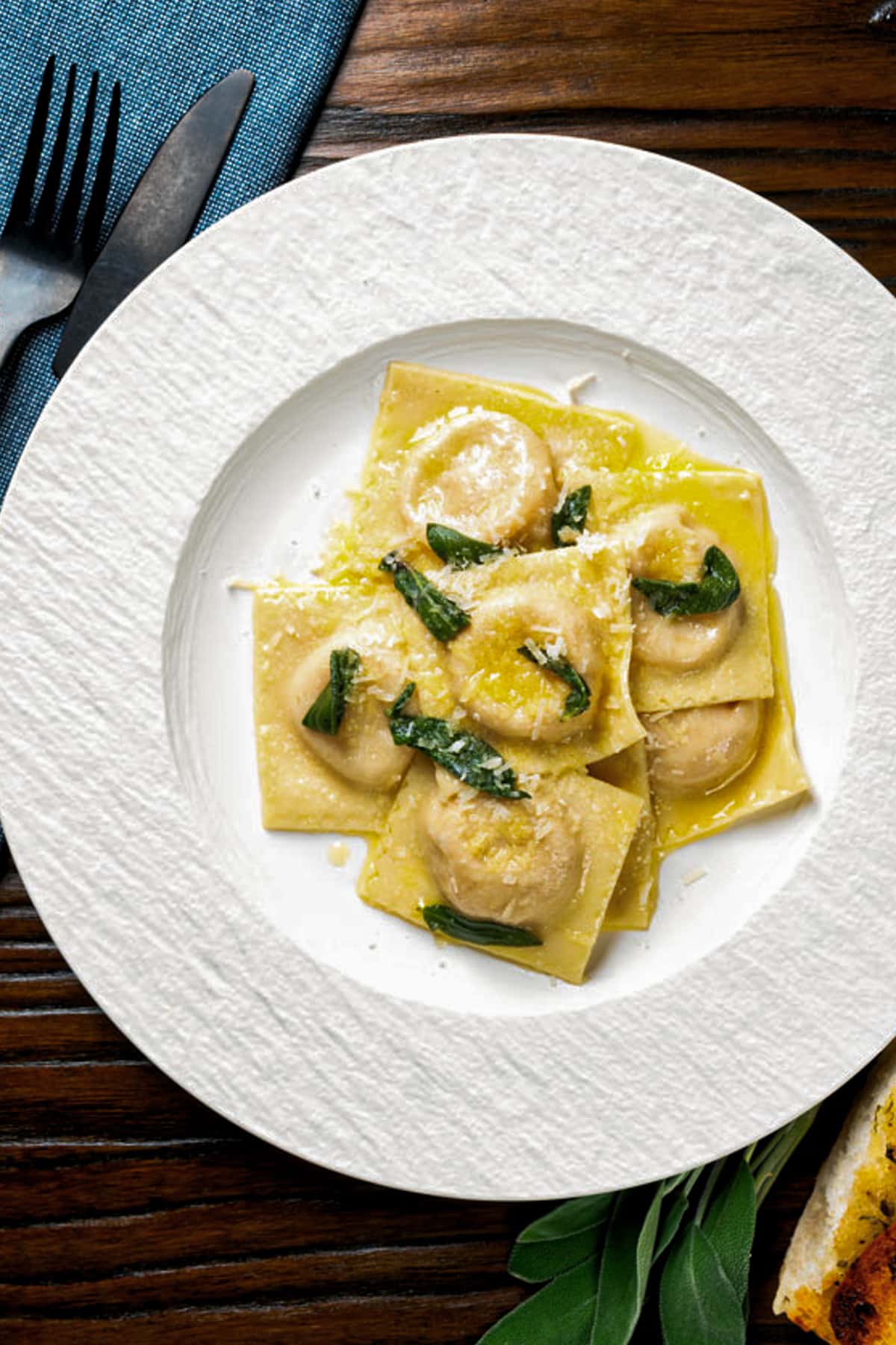 Ravioli on a white plate.