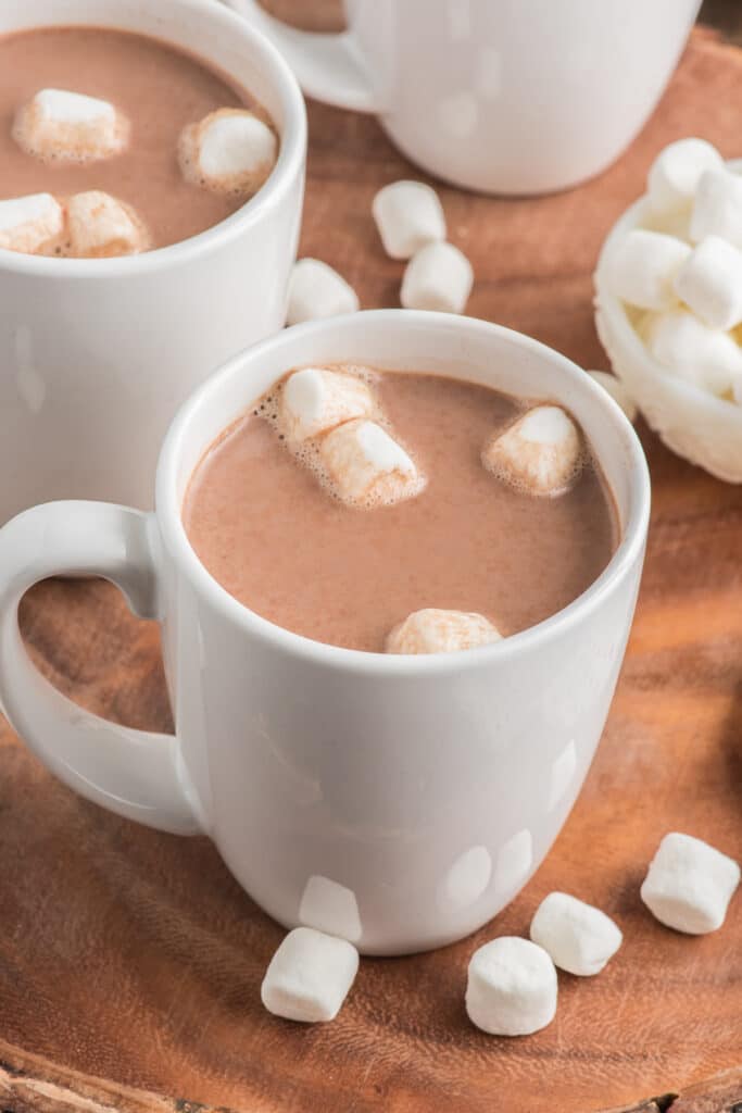 Drink in a white cup with mini marshmallows.