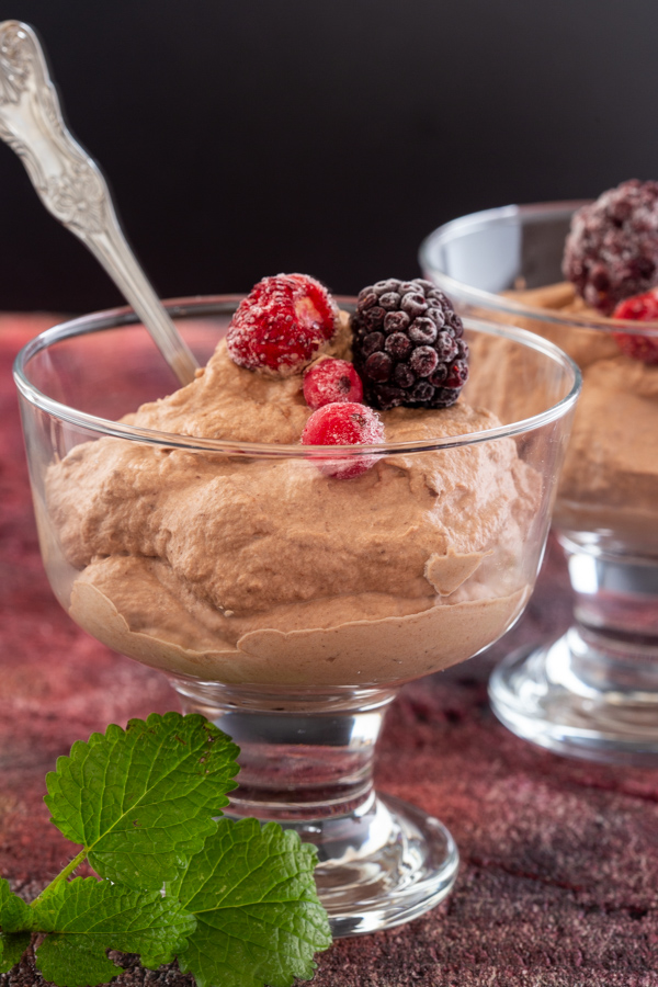 chocolate mousse in a glass with a spoon
