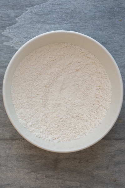 The whisked dry ingredients in a white bowl.