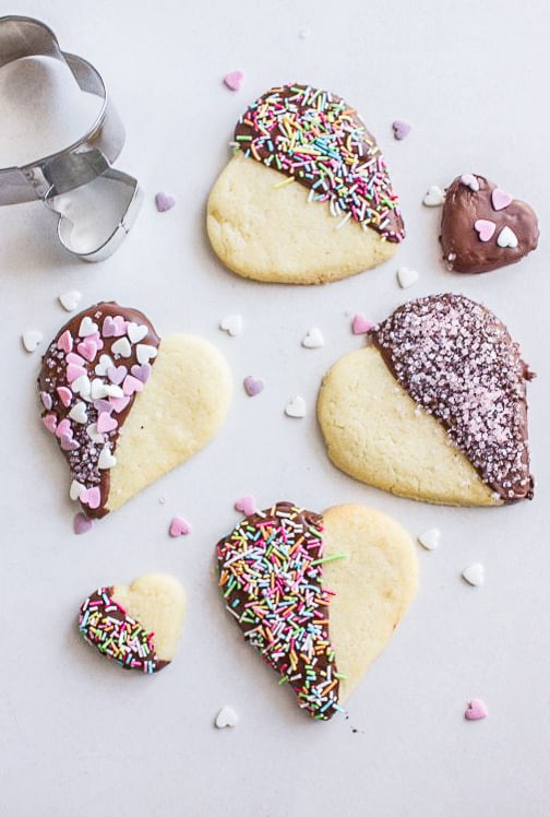 cookie shaped heart cookies on a white board
