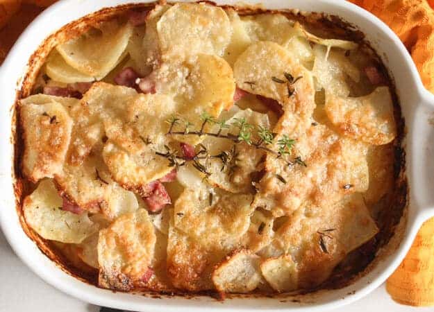 Parmesan Potato Ham Bake, a fast and easy cheesy potato side dish recipe perfect for dinner or even Breakfast. Delicious.