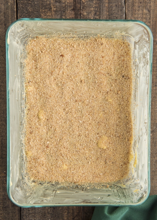 Butter and crumbs on the bottom of the baking dish.