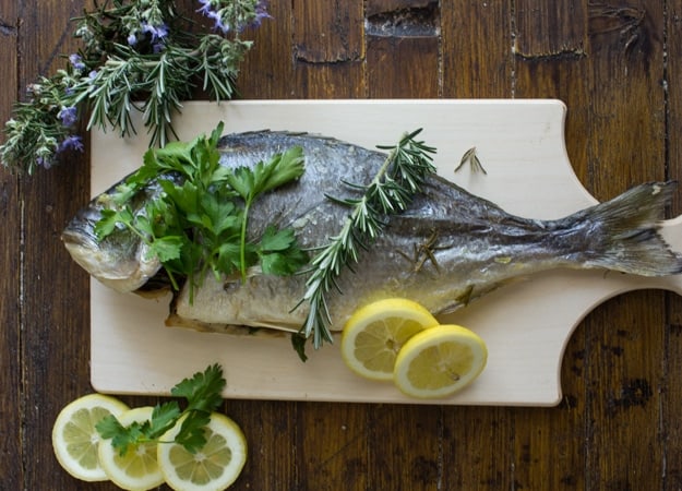 Baked Whole Gilt-Head Seabream or Trout, an easy healthy Italian baked whole fish recipe. A delicious family dinner.