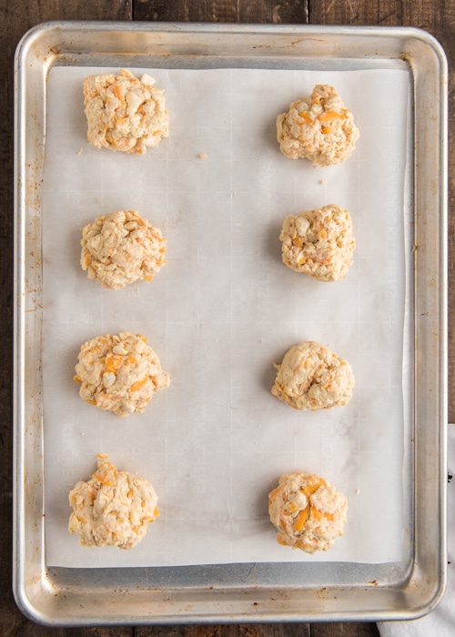 the biscuits on parchment paper on a baking sheet.